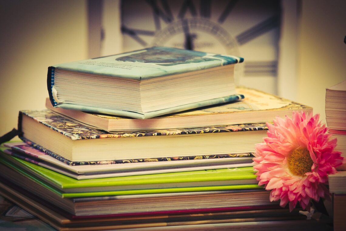 Picture of books and a flower