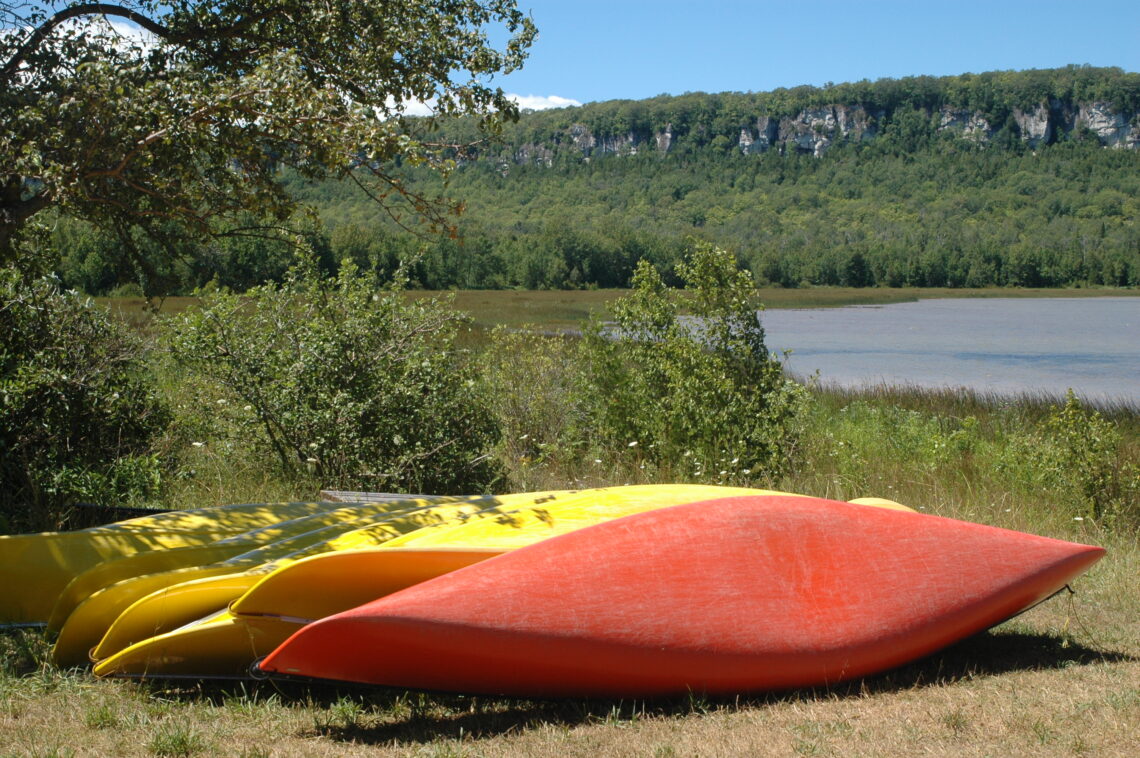 Canoes along the shore at Cape Croker © J. L. james
