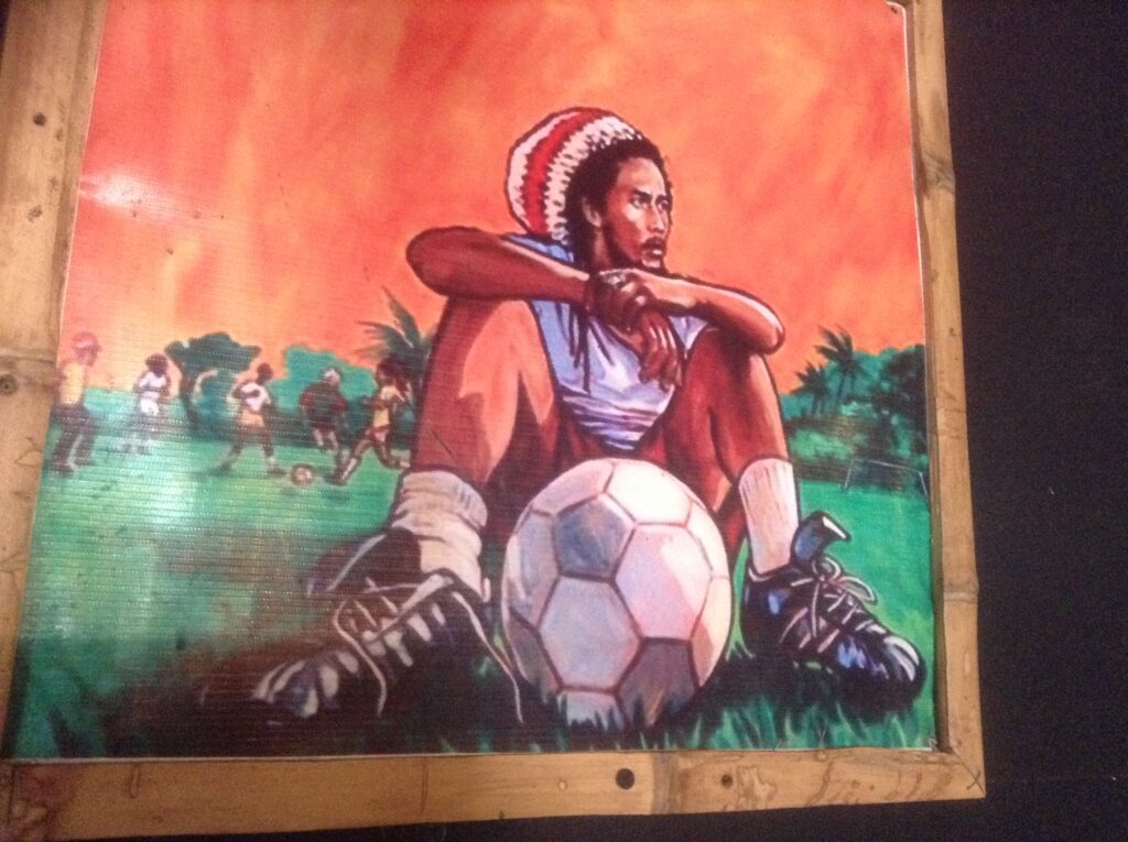 Painting of Bob Marley at  Jamaica Free Town Restaurant  J. L. James
